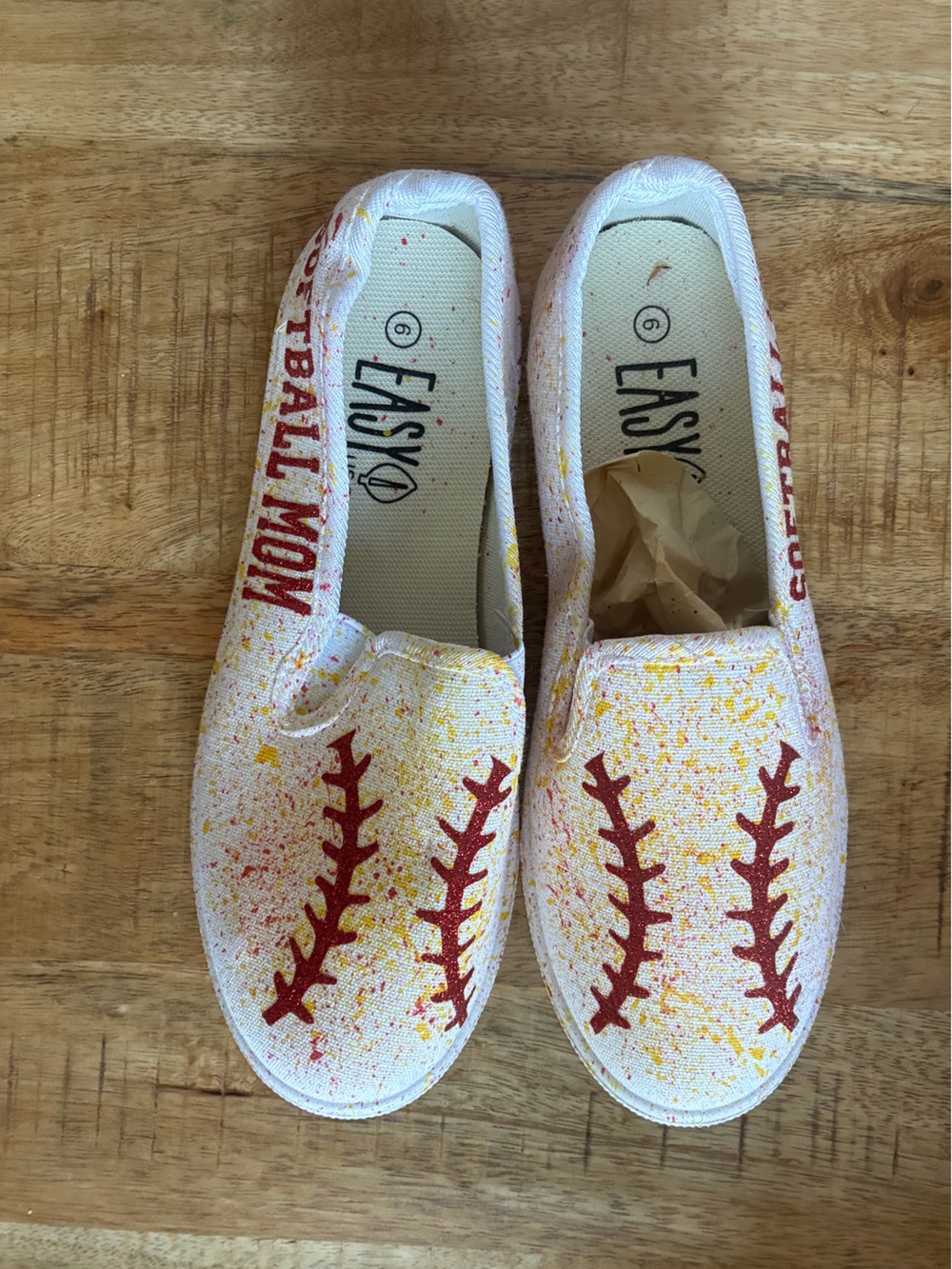 Easy Spirit women’s "Softball Mom" White Slip-On Shoes with Red Stitch Detail